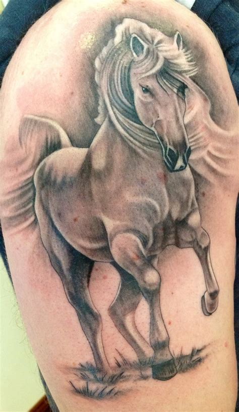 Featuring a colorful running chestnut horse and pink rose, this is a beautiful tattoo design for a woman. 70 Simple and Catchy Horse Tattoo Designs Ideas