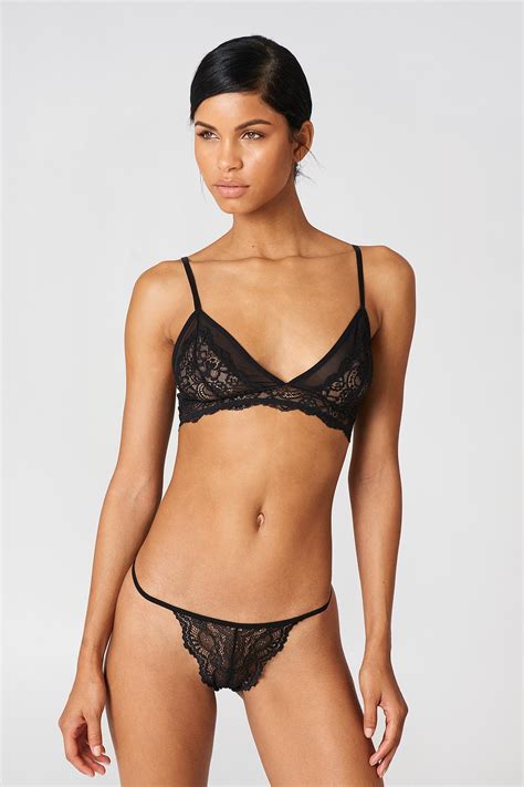 Nakd $1.22 $0.01 0.8% price as of february 19, 2021, 9:00 p.m. NA-KD Strap Lace Briefs Black in Black - Lyst
