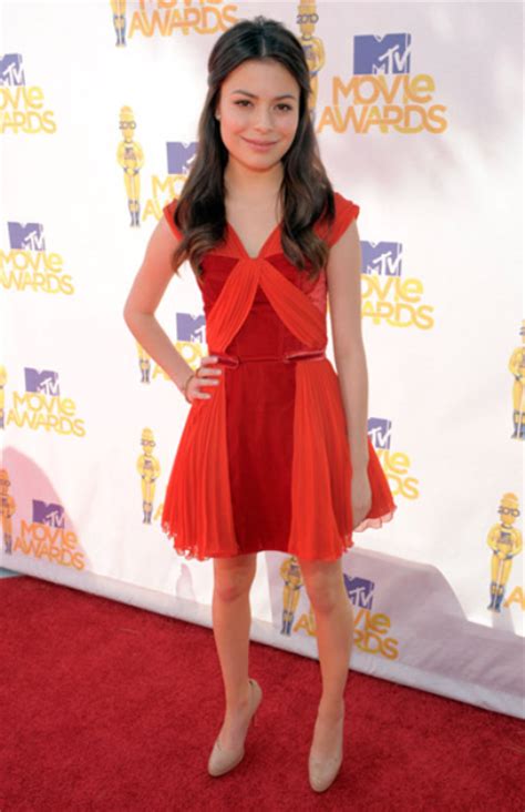 This miranda cosgrove photo contains bikini, two piece swimsuit, and bathing suit. TeenCelebBuzz: Miranda Cosgrove: 2010 MTV Movie Awards