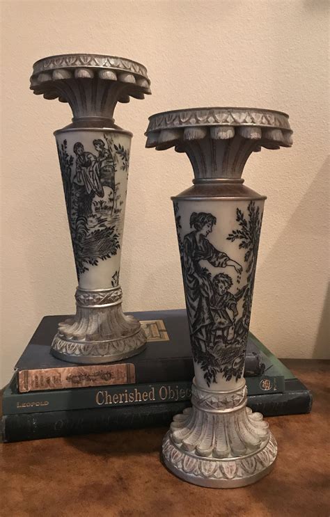 The candle holders come in a black and copper color combination. Pair of Vintage Candlestick Holders with a Black and White ...