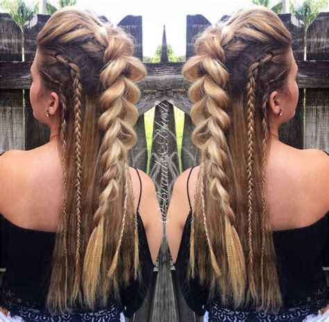 Longer faux hawks can be styled in a number of ways. /braidsandblush/ Faux Mohawk and side braids! Festival ...