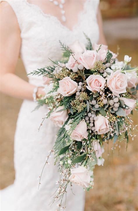 As blush is such a soft color, it would look lovely in both a spring wedding summer bouquet, as well as a summer wedding bouquet. This blush pink rose cascading bridal bouquet with ...