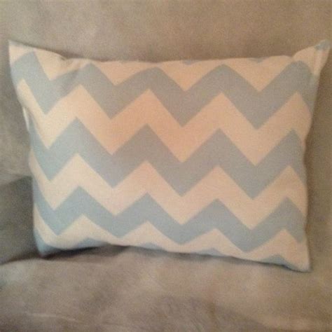 Use this gorgeous pillow for decorate the bed. Light Blue Chevron Decorative Pillow | Decorative pillows, Blue chevron, Decor