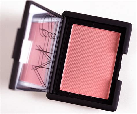 Nars' richly pigmented peach blush is a winning choice for those with fair to medium complexions. NARS Deep Throat Powder Blush Review & Swatches