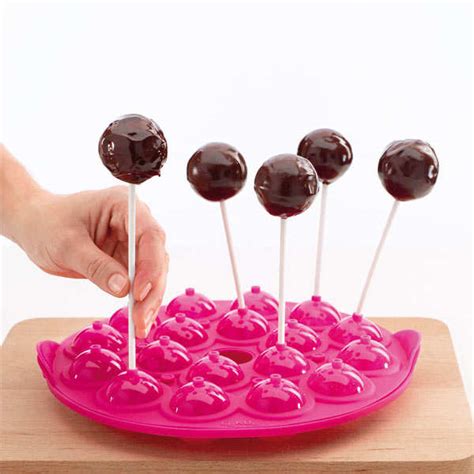 Cake batter, silicone cake pop moulder, silicone spatula (small), 1 measuring spoon (1 tbsp.), oven, silicone brush, ⅛ cups oil, 1 rack, 1 rectangular pan, 1 pot holder. Silicone cake pops mould - Lékué