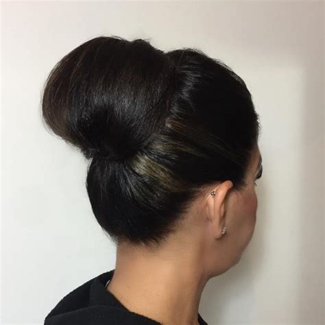 For example, you can try tying your hair half up, half down. Excellent and Elegant Bun Hairstyles For Long Hair - Fashionre