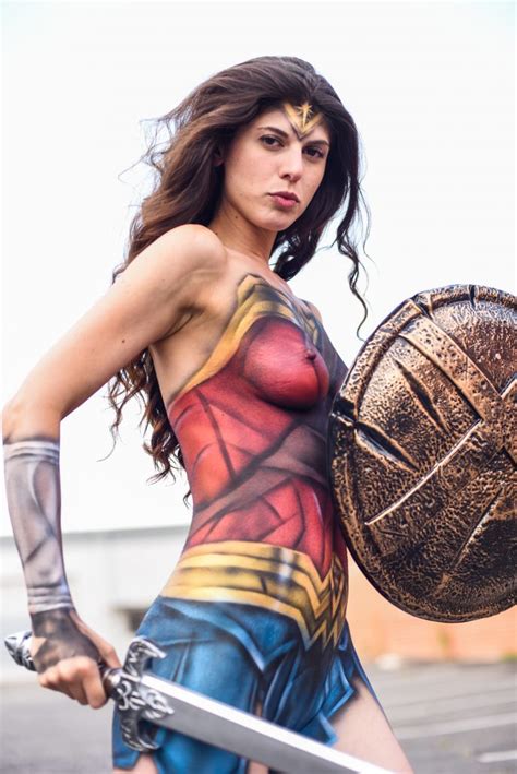 Women are also more obsessed with their bodies than men. » Artist transforms model into wonder woman