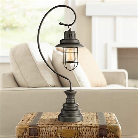 The base measures 6 1/4 in diameter. Ulysses Oil-Rubbed Bronze Industrial Lantern Desk Lamp ...