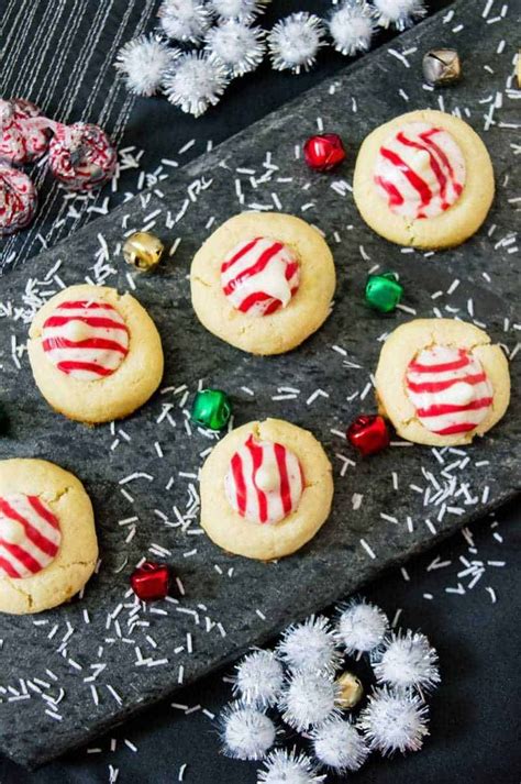 Wow, talk about hershey overload. Not only do these Candy Cane Hershey Kiss Cookies look festive, but these holiday cook ...
