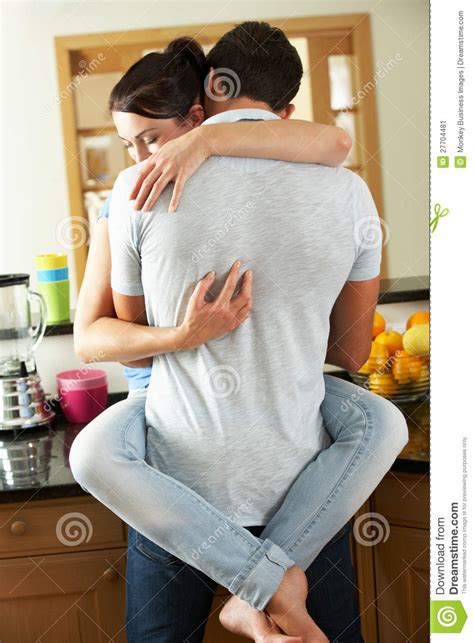 Share the best gifs now >>>. Romantic Couple Hugging In Kitchen Stock Image - Image of ...