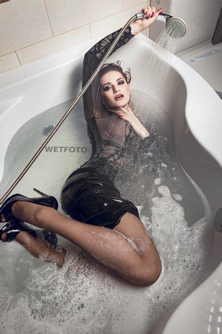 Tina taking a bath in nylon. Pin on heels in the bath/shower