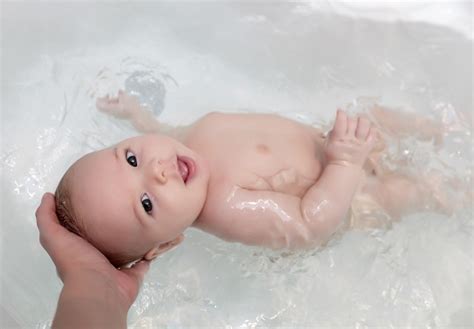 While it is safe to bathe a baby twice a day, it isn't necessary and it certainly isn't good for the baby's skin. It can be nerve-wracking for new parents to bathe a ...