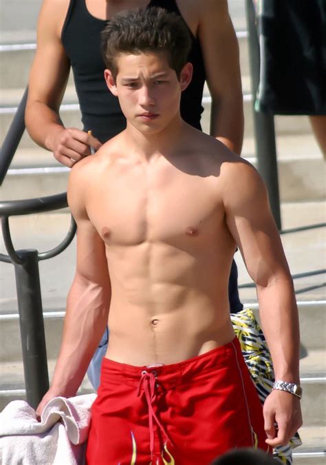 Black and white waist up of young shirtless teenage boy holding face in hands in studio with dramatic lighting and. Young FIT Boys (@18_fitness_boys) | Twitter