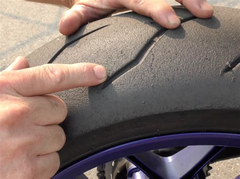 The most obvious sign that you should replace your motorcycle tires is if the tread is worn past its safe level of depth. Contact Patch: Rebound Tire Wear - Dave Moss Tuning