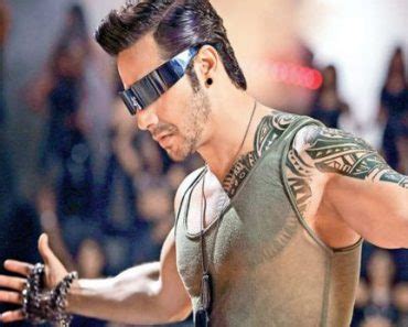 Varun has a tribal tattoo inked on his left shoulder, which he has copied from his idol and hollywood superstar, dwayne johnson. Christina Ricci's 8 Tattoos & Their Meanings - Body Art Guru