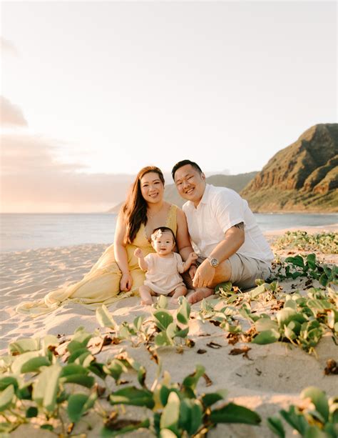 A sandy beach with two parasols at sunset. Pin on Desiree Leilani Photography