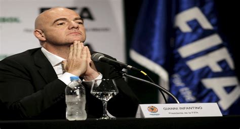 Looking for the definition of conmebol? FIFA President Infantino gestures during a news conference ...