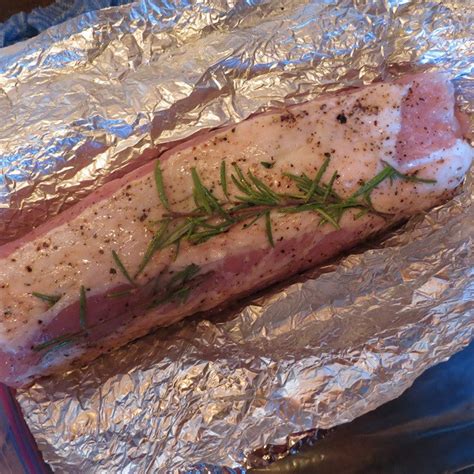 Line a rimmed baking sheet or shallow roasting pan with foil. Roasting Pork In A Bed Of Kitchen Foil / Herb Roasted Pan Seared Pork Tenderloin ...