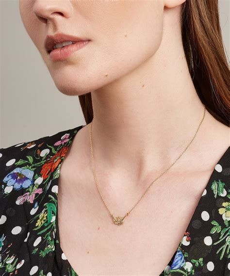 Free uk delivery & returns. Little Feather Necklace | Liberty London