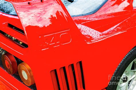 Pearl white, w/ferrari logo on hood, red hw logo on rear, tan interior, unpainted malaysia base, w/white5dot's: Ferrari F40 supercar of the 1980s rear spoiler detail at a class Photograph by Sjoerd Van der Wal