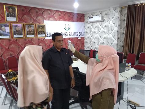 It was first identified in december 2019 in wuhan,. Pegawai Kejati Sulbar Lakukan Cek Suhu Badan Antisipasi ...