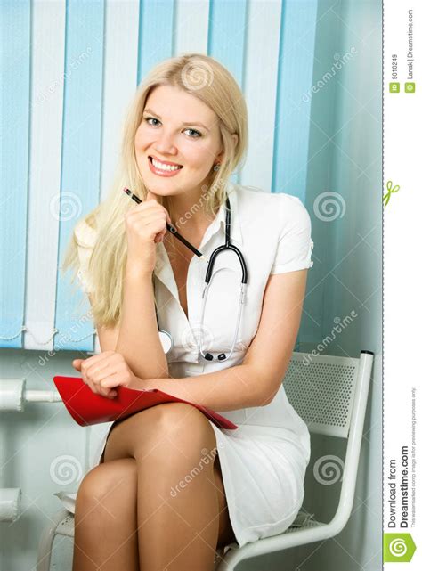 She was a little forgetful so she didn't at the same time she overbalanced and put her hand in the cream, spilling it all over the tablecloth. Beautiful Doctor In Her Office Royalty Free Stock Images ...