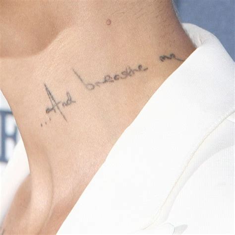 It boosts up the energy levels and intuition power. Ruby Rose "...And Breathe Me" Neck Tattoo | Steal Her Style