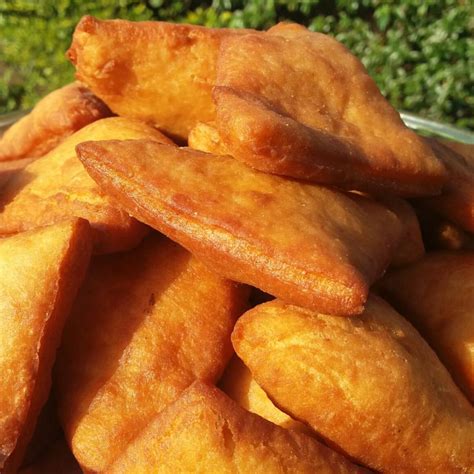 A mandazi if a form of fried dough that originated in east africa in the swahili coastal areas of kenya and. mamakebobojikoni in 2020 | Mandazi recipe, Recipes, Kfc ...