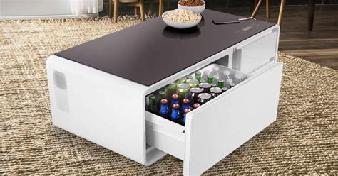 It features a capacious tempered glass top surface that's 51 wide and 26 long. Smart Coffee Table is a Perfect Hi-Tech Companion for TV ...