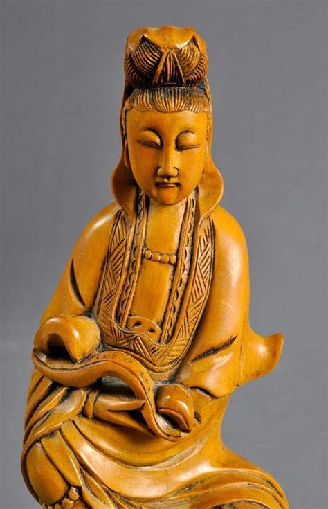 Before europeans arrived, people carved totems from wood using seashells or stone axes. iGavel Auctions: Seated Guanyin Wood Carving;W1DML