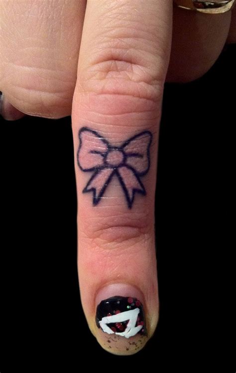 Consider how you tie up a bow on a gift. Crown Tattoo On Finger For Girls