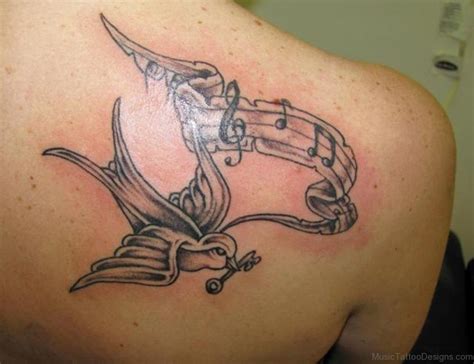 Guys can use these tattoos to show off musical skill. 51 Stunning Music Tattoos For Guys