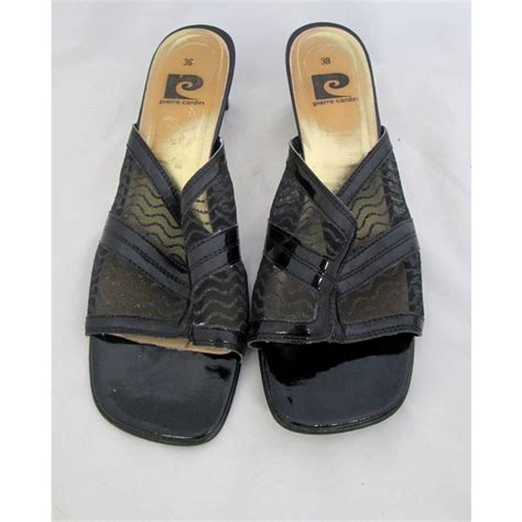First couturier to bring women fashion down into the street and revolutionize men's style. Pierre Cardin Size 5.5 Black Sandals Pierre Cardin - Size ...