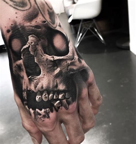 I've read so many negative things about tattoos that incorporate a skull that i have to say people are hands and skull tattoos are a great combination. Evil Skull Hand Tattoo | Best tattoo design ideas