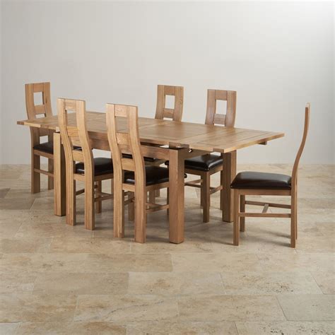 Name of product:solid oak dining table and leather chair sets solid oak dining table size: Dorset Dining Set: Extending Table in Oak + 6 Leather Chairs