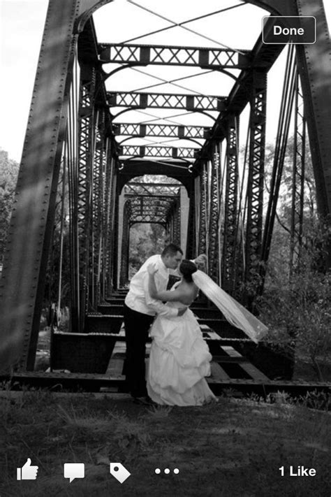 We don't care how big or small your wedding is, it is still your wedding day and it should be celebrated regardless if it is just the two of you or 500 people, we want to be there to document it. Wedding photo: abandoned train track bridge | Wedding photos, Abandoned train, Photography poses