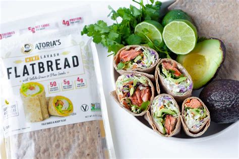 Grilled white fish, sweet mango salsa and crema for the best fish tacos in under 30 minutes! Fish Tacos Wraps | Mediterranean Diet | The Domestic Dietitian