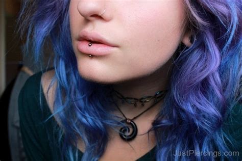 Jewelry is often around 14 gauge labret studs or even jeweled labret studs. Middle Bottom Lip Piercing