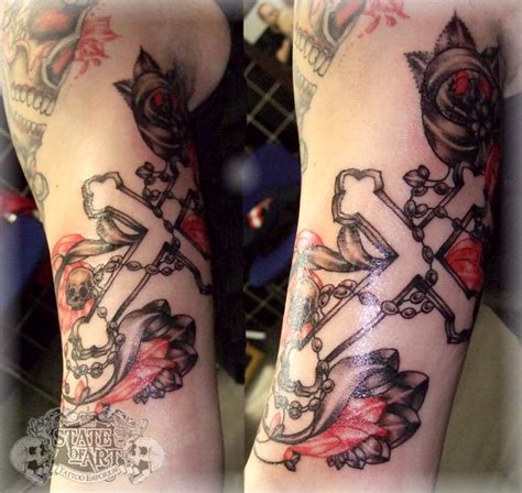 Cross tattoo represents different things to people. Cross inside arm by state-of-art-tattoo on DeviantArt
