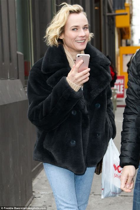 Sou uma pessoa muito apaixonada e curiosa por tudo e um pouco mais. Make-up free Diane Kruger lugs laundry in New York | Daily ...