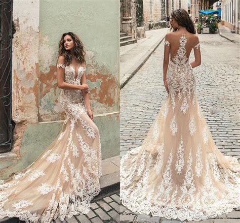 But for the brides who want to straddle the line between traditional and modern, the neutral hues of a champagne gown will give you the perfect look that teems with classic romance for your wedding. Berta 2019 Champagne Mermaid Wedding Dresses Sheer Jewel ...