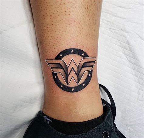 27 best wonder woman tattoo images on pinterest | feminine. Wonder Woman logo by Artist @donmeatball @royalfleshtattoo ...