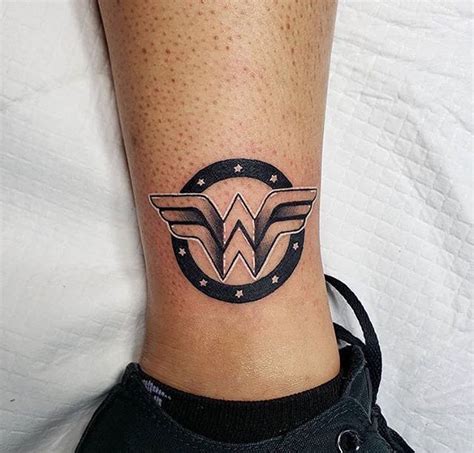 Fan club art abyss wonder woman. Wonder Woman logo by Artist @donmeatball @royalfleshtattoo ...