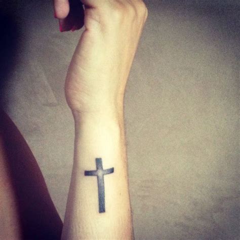 Cross tattoo with anchor design on wrist. 47 Stylish Cross Tattoos For Wrists