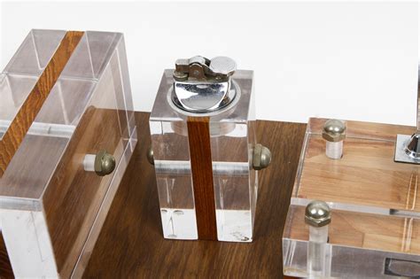 While the nearly invisible look of acrylic furniture is striking on its own, it also allows other pieces in the space to shine. Vintage Astrolite Lucite Desk Accessories : EBTH