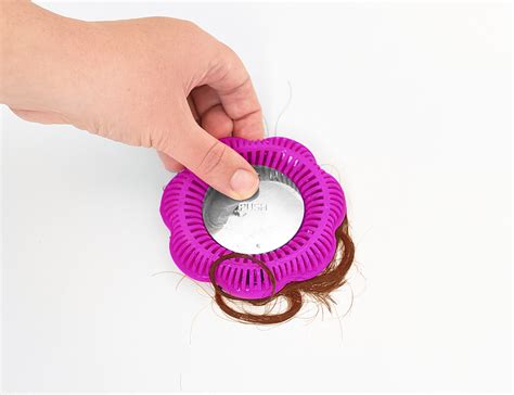 Bathtub hair catcher neatly collects every hair that attempts to go down your drain. This bathtub hair catcher won't let a single piece of hair ...