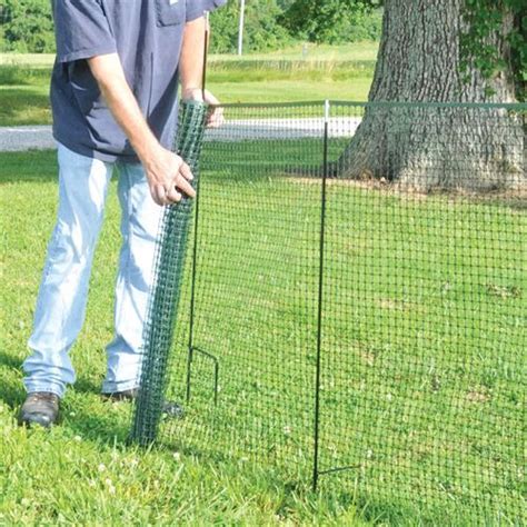 Description our dog fence kits include everything that you will need to assemble a basic enclosure around your yard to keep your pets safe. One Step Temporary Fencing Kit | Diy dog fence, Dog fence ...