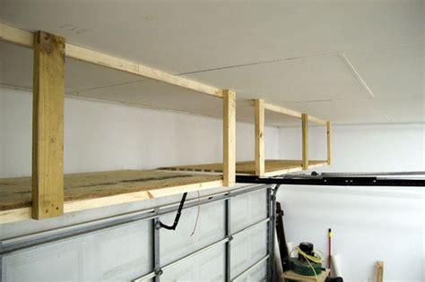 Installing overhead garage storage is a great way to gain storage space while sacrificing zero floor space. DIY Garage Ceiling Storage in 2019 | Overhead garage storage, Garage ceiling storage, Garage ...