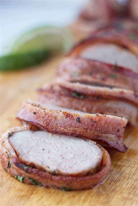 We made these on the napoleon kettle grill, but you can also after your pork has been seasoned it is now time to take your bacon strips that have been cut in half and wrap it around the meat. Traeger Pork Tenderloin Recipes : How To Smoke Pork Loin Honey Orange Pork Tenderloin Slowpoke ...