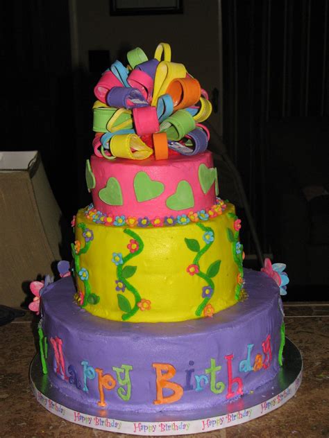 If you find these birthday cake ideas helpful, kindly share this post to your social networks. 3 layer girl birthday cake, gumpaste multi colored bow ...